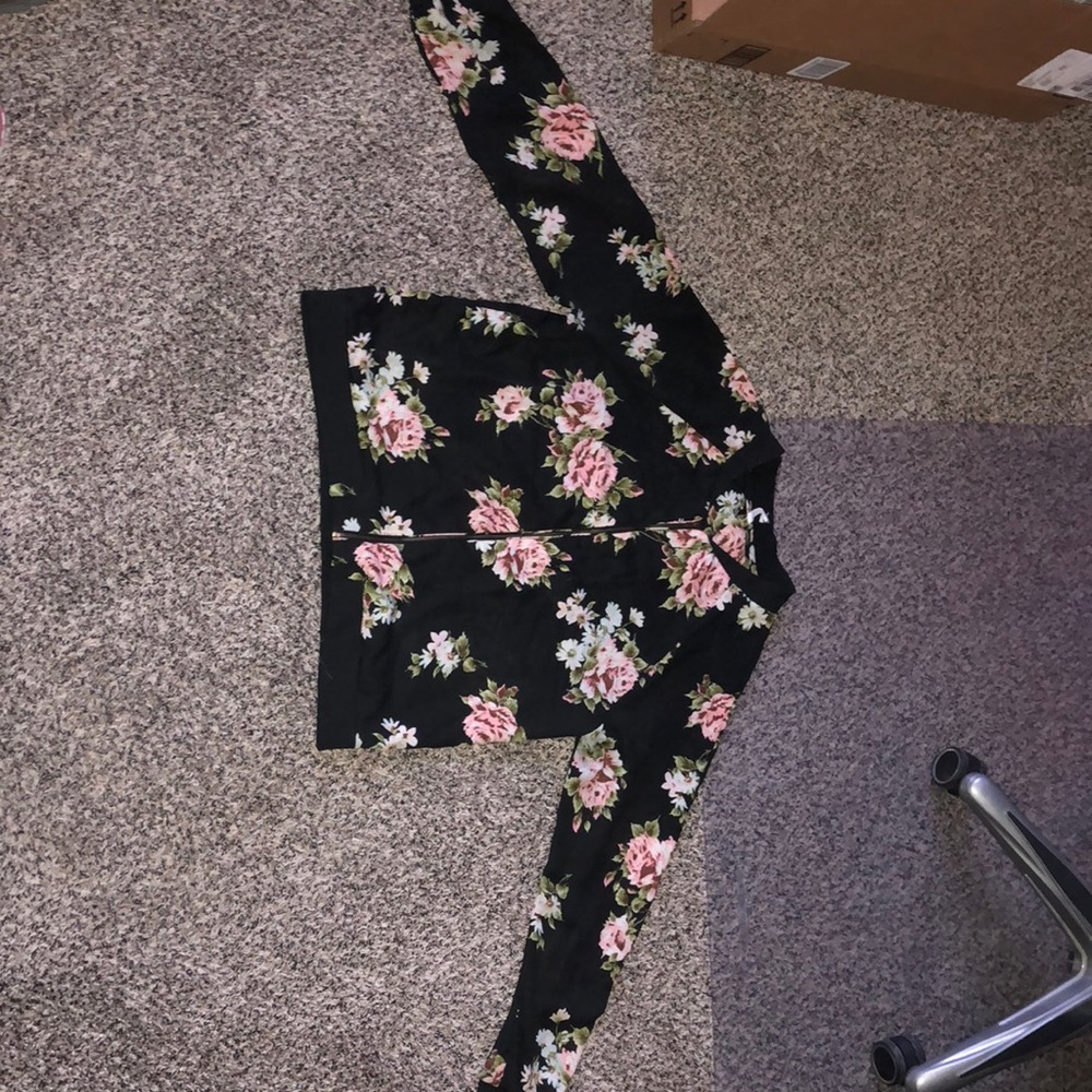 Cute THIN jacket to pair with shirts.